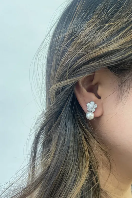 Floral Pearl Stud Earrings In Silver by SVNX sold by Goddiva