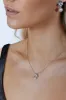 Dainty Bow Pearl Pendant Necklace by SVNX sold by Goddiva