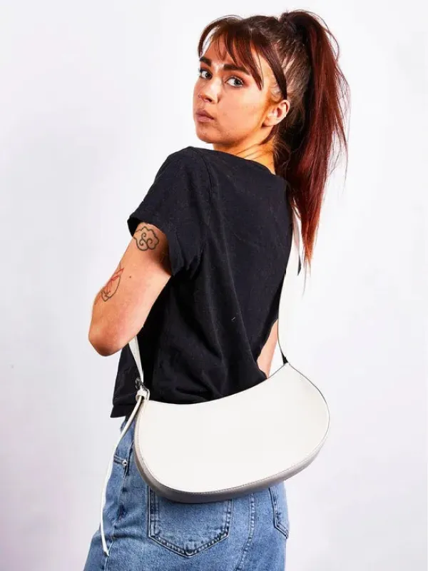 Saddle Bag In Off White by SVNX sold by Goddiva
