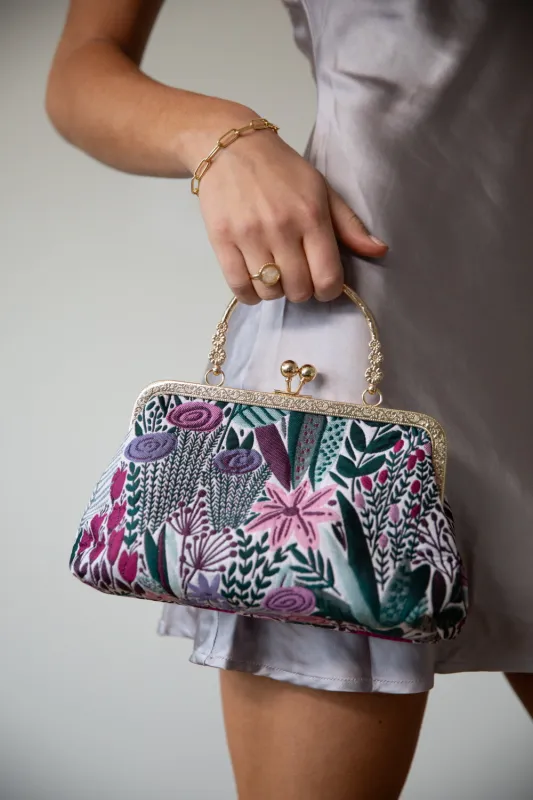 Floral Embroidered Clutch Bag by SVNX sold by Goddiva