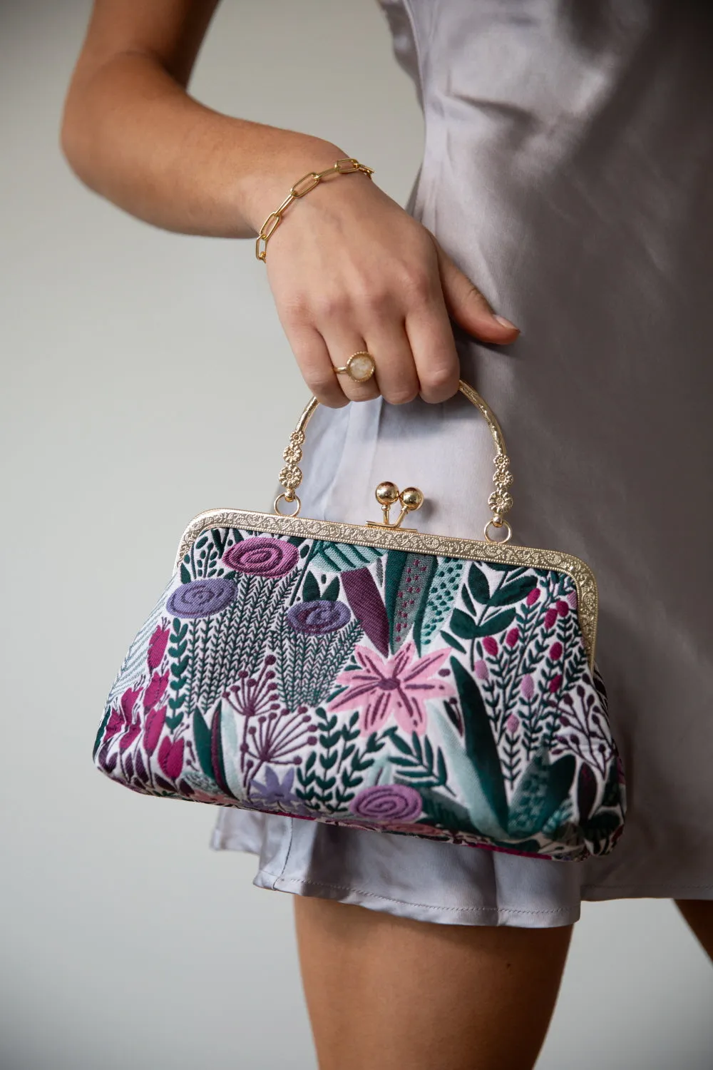 Floral Embroidered Clutch Bag by SVNX sold by Goddiva