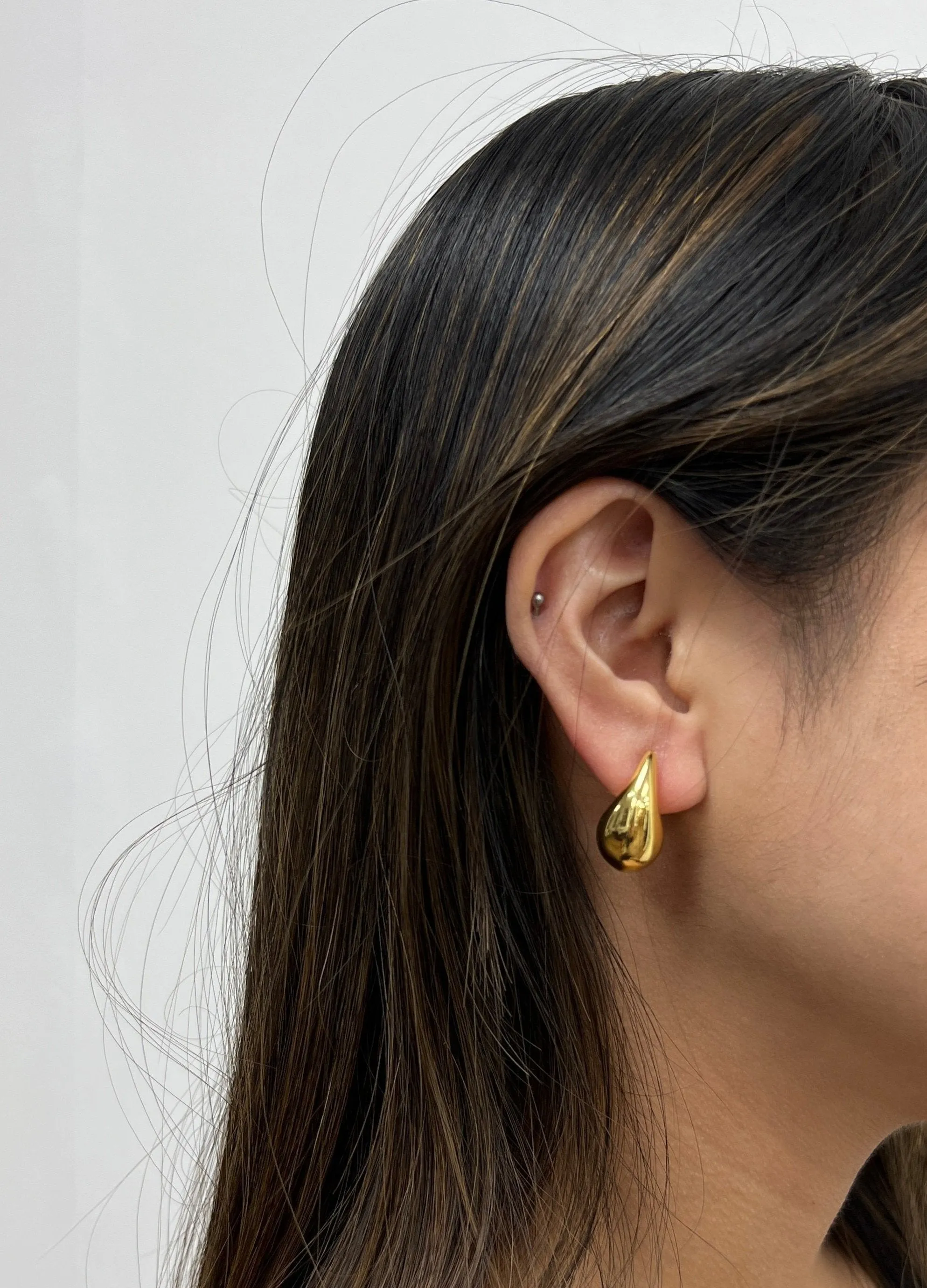 Mini Waterdrop Earring In Gold by SVNX sold by Goddiva