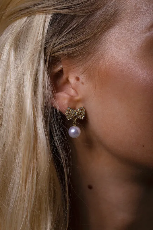 Diamante Bow Pearl Drop Earrings - Gift Boxed by SVNX sold by Goddiva