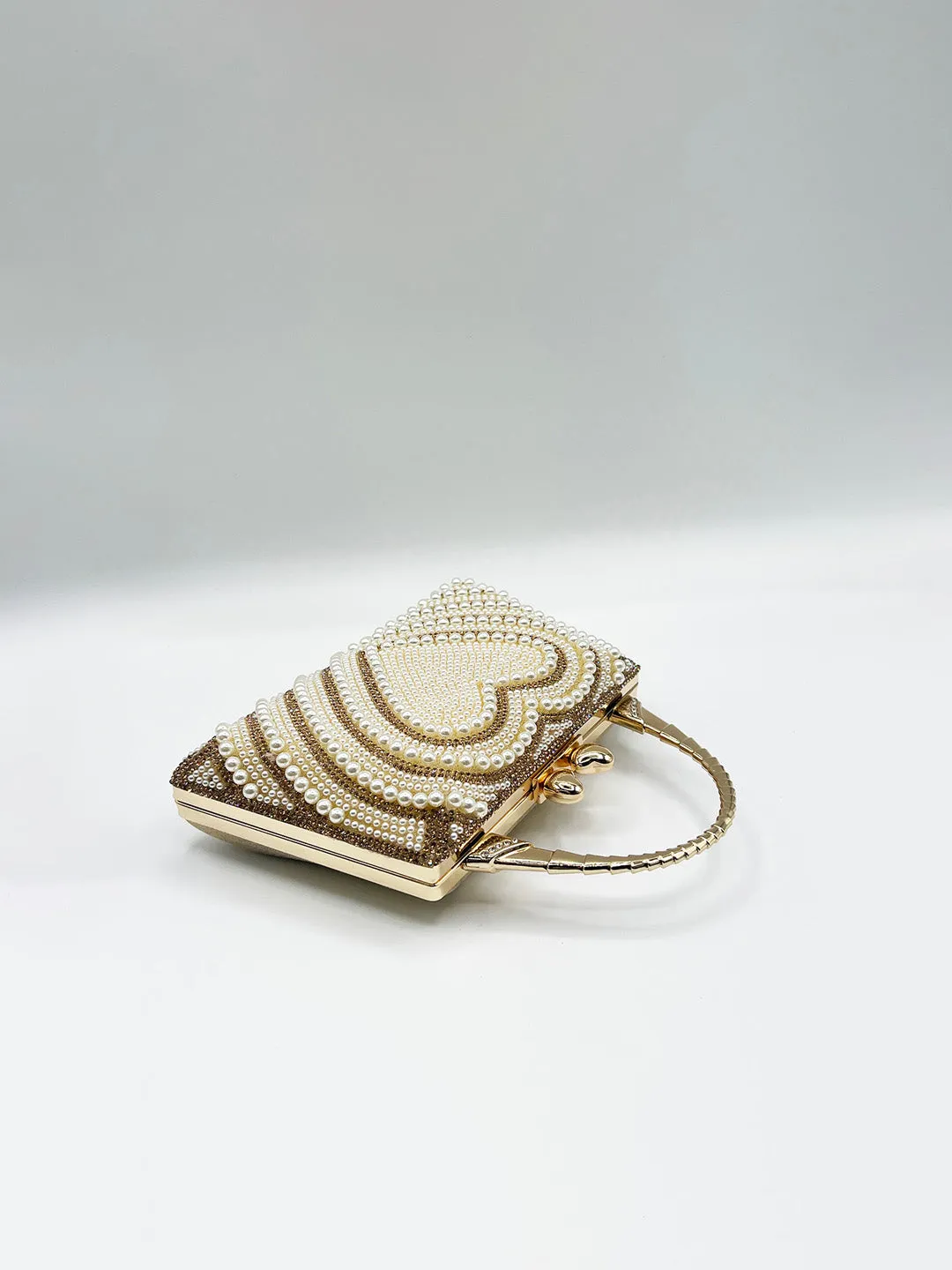 Heart Pearl Clutch Bag In Gold by SVNX sold by Goddiva product image thumbnail 5