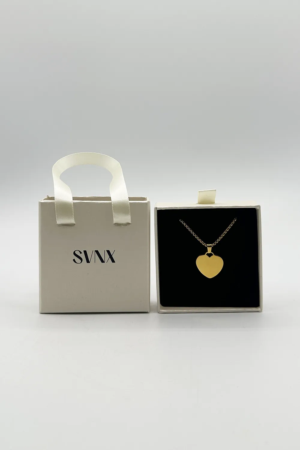 Heart Shape Pendant Necklace In Gold - Gift Boxed by SVNX sold by Goddiva product image thumbnail 3