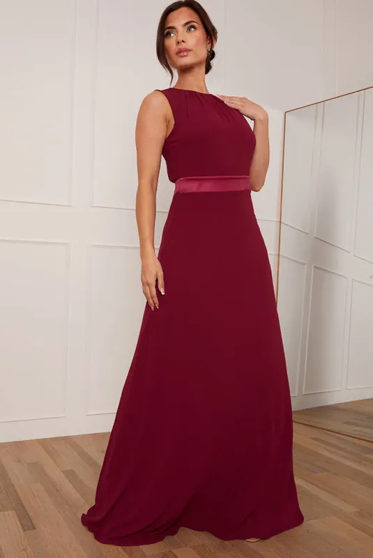 Petite Cut-Out Bow Back Maxi Dress In Wine by Chi Chi London sold by Goddiva