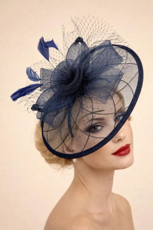 Floral Bow Mesh Detailing Fascinator In Navy by SVNX sold by Goddiva