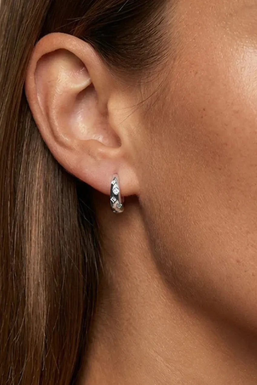 Starburst Huggie Hoop Earrings by MUCHV sold by Goddiva