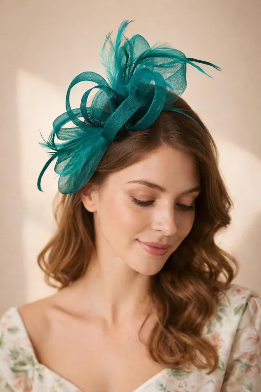 Bow Feather Fascinator In Dark Green by SVNX made by Goddiva