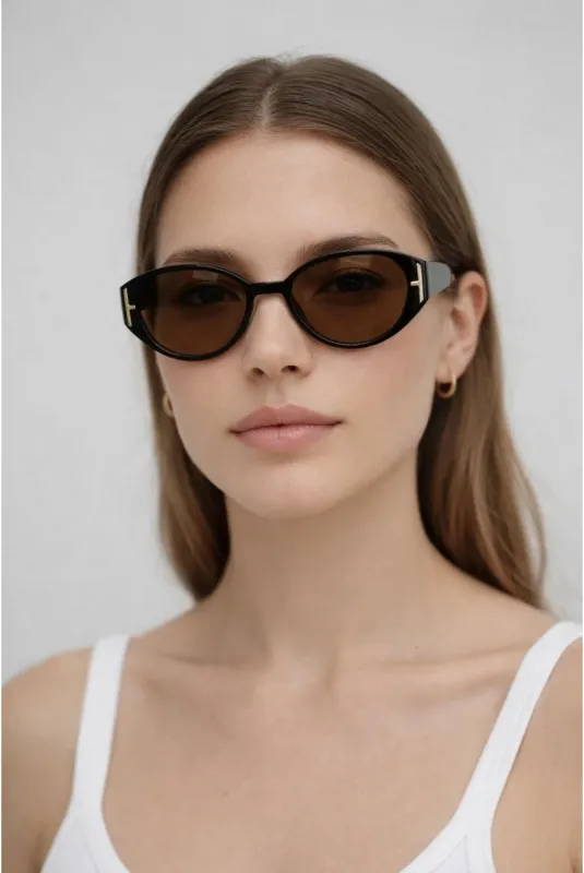 Round Cat Eye Detail Sunglasses In Black by SVNX made by Goddiva