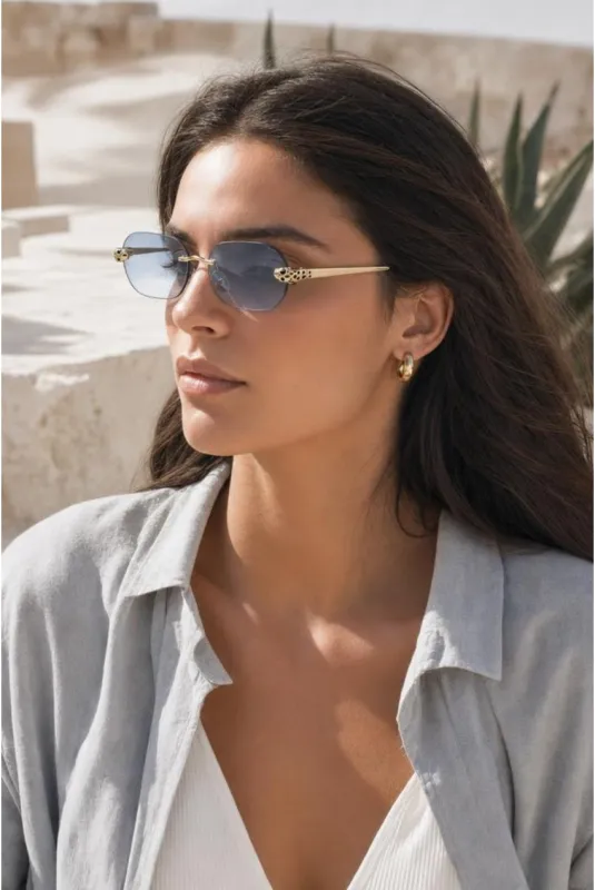 Jaguar Detail Rimless Sunglasses In Blue by SVNX made by Goddiva