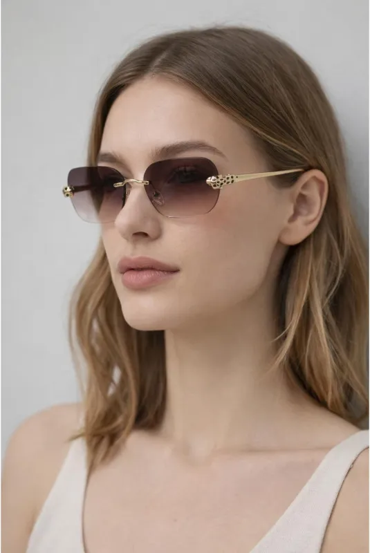 Jaguar Detail Rimless Sunglasses In Brown by SVNX made by Goddiva