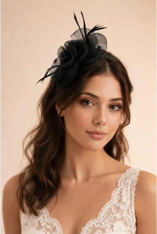 Rosette Bow Fascinator In Black by SVNX made by Goddiva