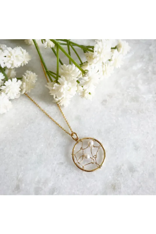 Wisteria London Pearl Dreamcatcher Necklace sold by Goddiva