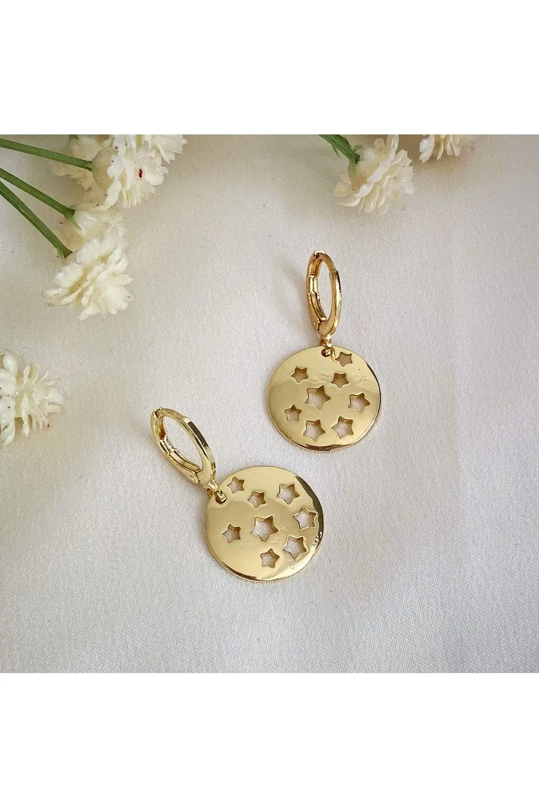 Wisteria London Halcyon Gold Star Huggie Hoop Earrings sold by Goddiva