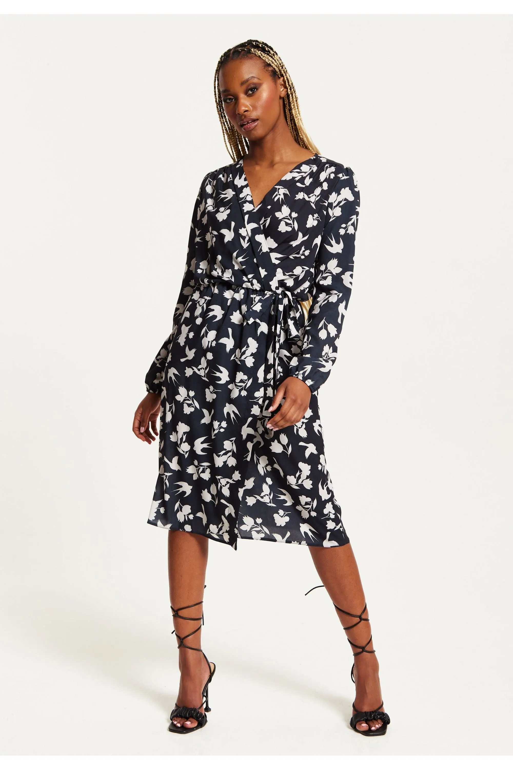Liquorish Floral And Bird Print Midi Fake Wrap Dress In Navy sold by Goddiva