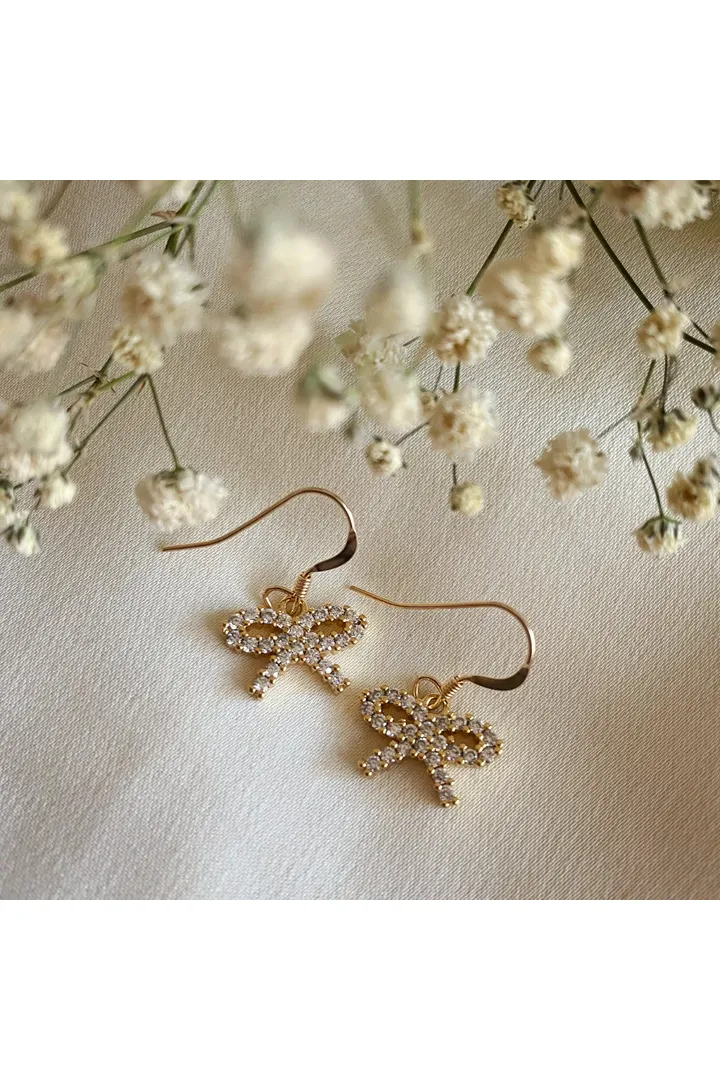 Wisteria London Audrey Dainty CZ Bow Earrings sold by Goddiva