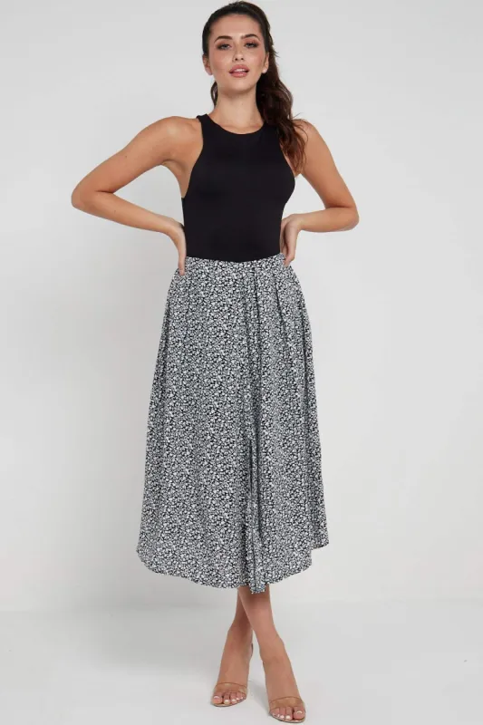LOVE SUNSHINE Black Ditsy Printed Side Slit Pleated Midi Skirt sold by Goddiva