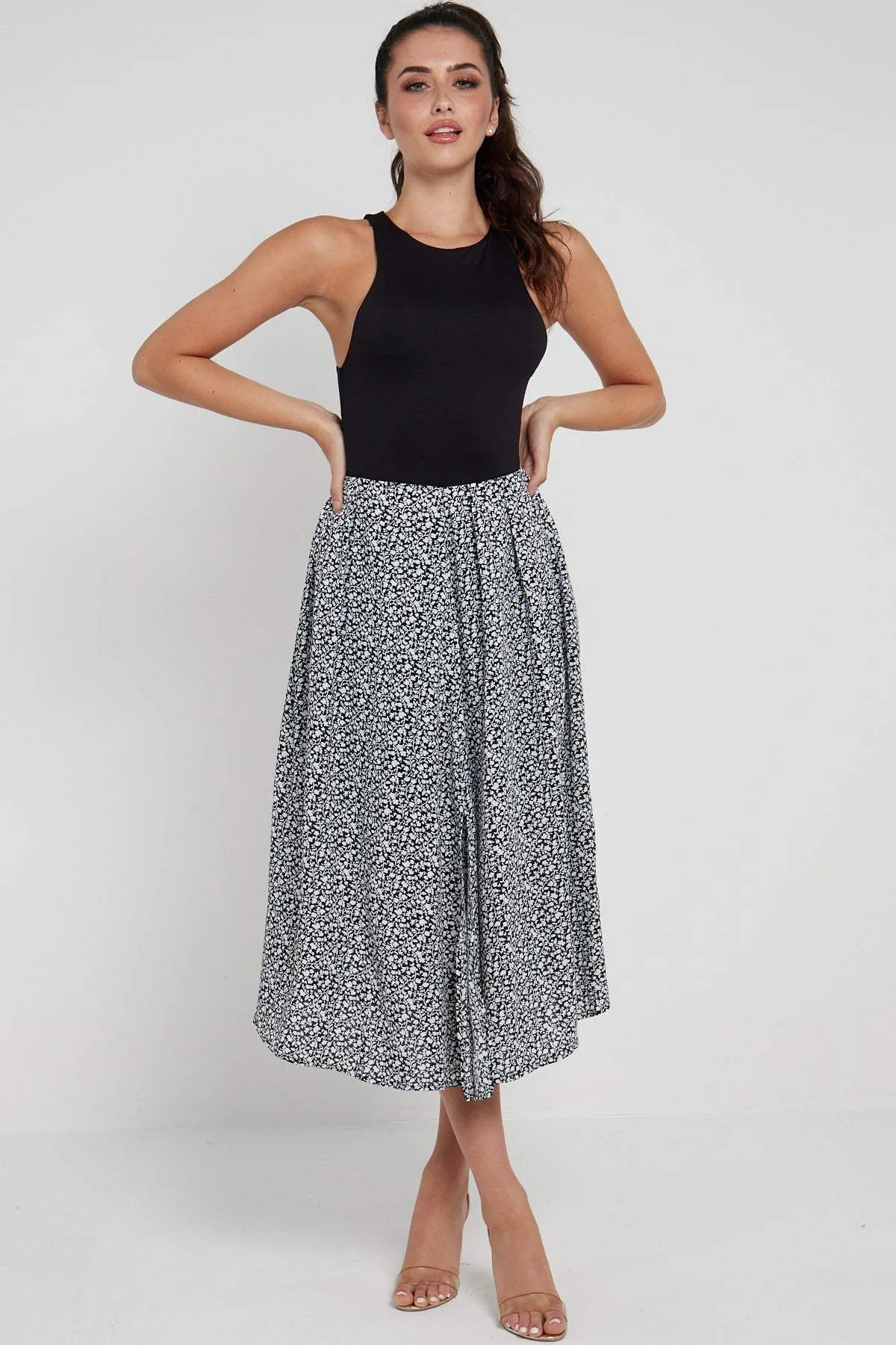 LOVE SUNSHINE Black Ditsy Printed Side Slit Pleated Midi Skirt sold by Goddiva