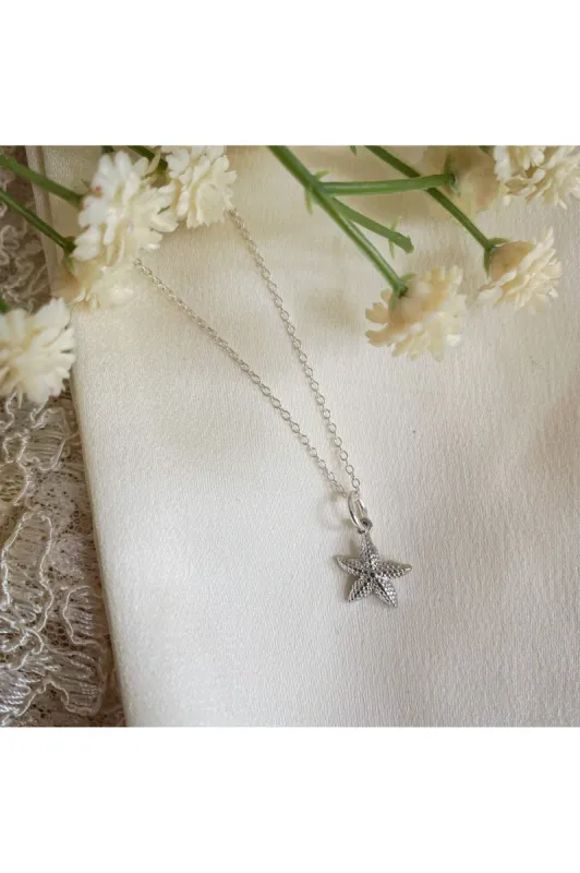 Wisteria London Luminara Silver Starfish Necklace sold by Goddiva