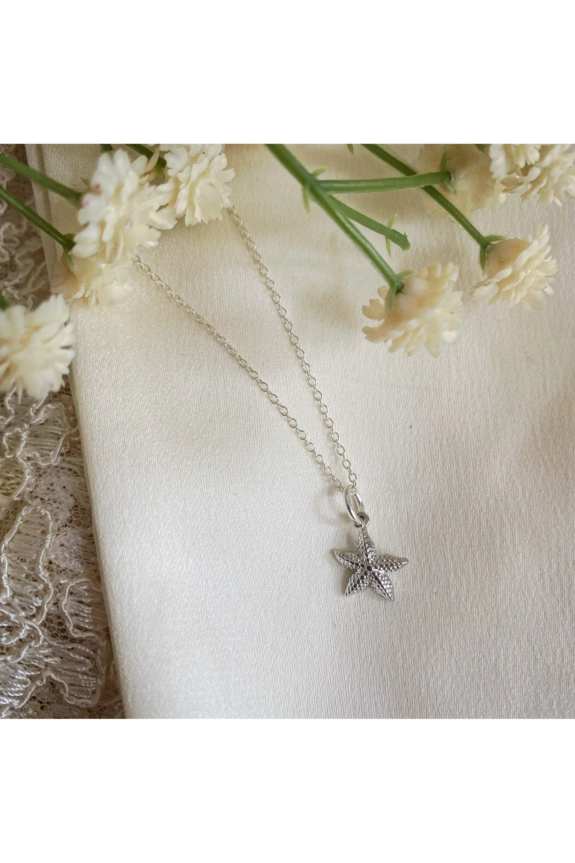 Wisteria London Luminara Silver Starfish Necklace sold by Goddiva