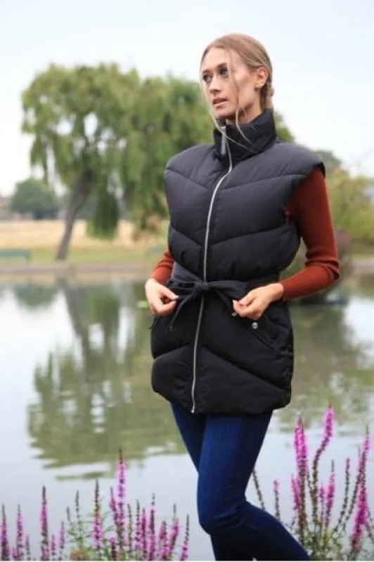 Black Belted Gilet Puffer by Double Second sold by Goddiva