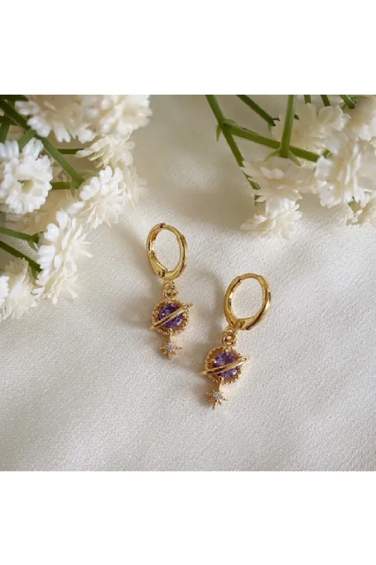 Wisteria London Orion Purple Planet And Star Huggie Hoops sold by Goddiva