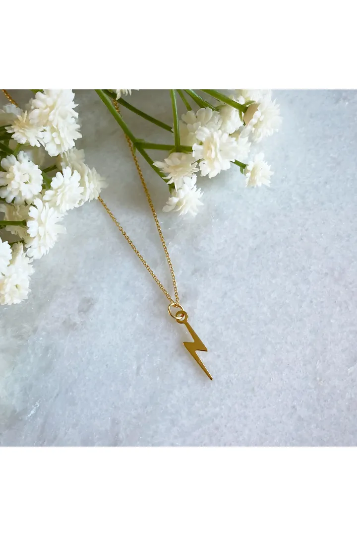 Wisteria London Dainty Gold Lightning Bolt Necklace sold by Goddiva