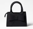 Crossbody bag sold by Rage