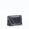 Crossbody bag sold by Rage