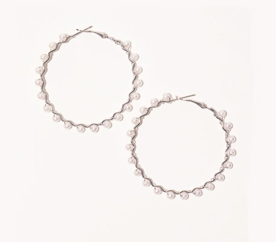 Hoop Earrings sold by Rage