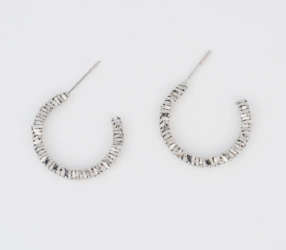 Hoop earrings sold by Rage