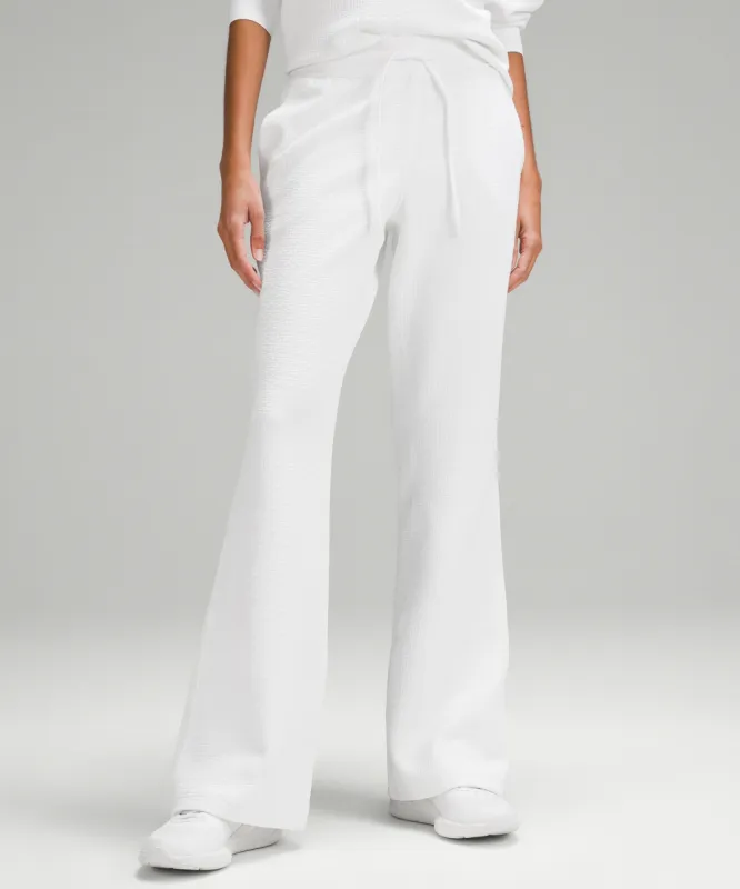 Textured High-Rise Flared Track Pant 32" sold by Lululemon