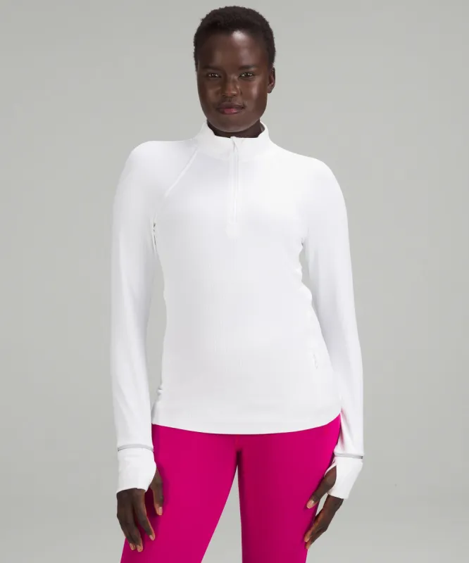 It's Rulu Run Ribbed Half Zip sold by Lululemon