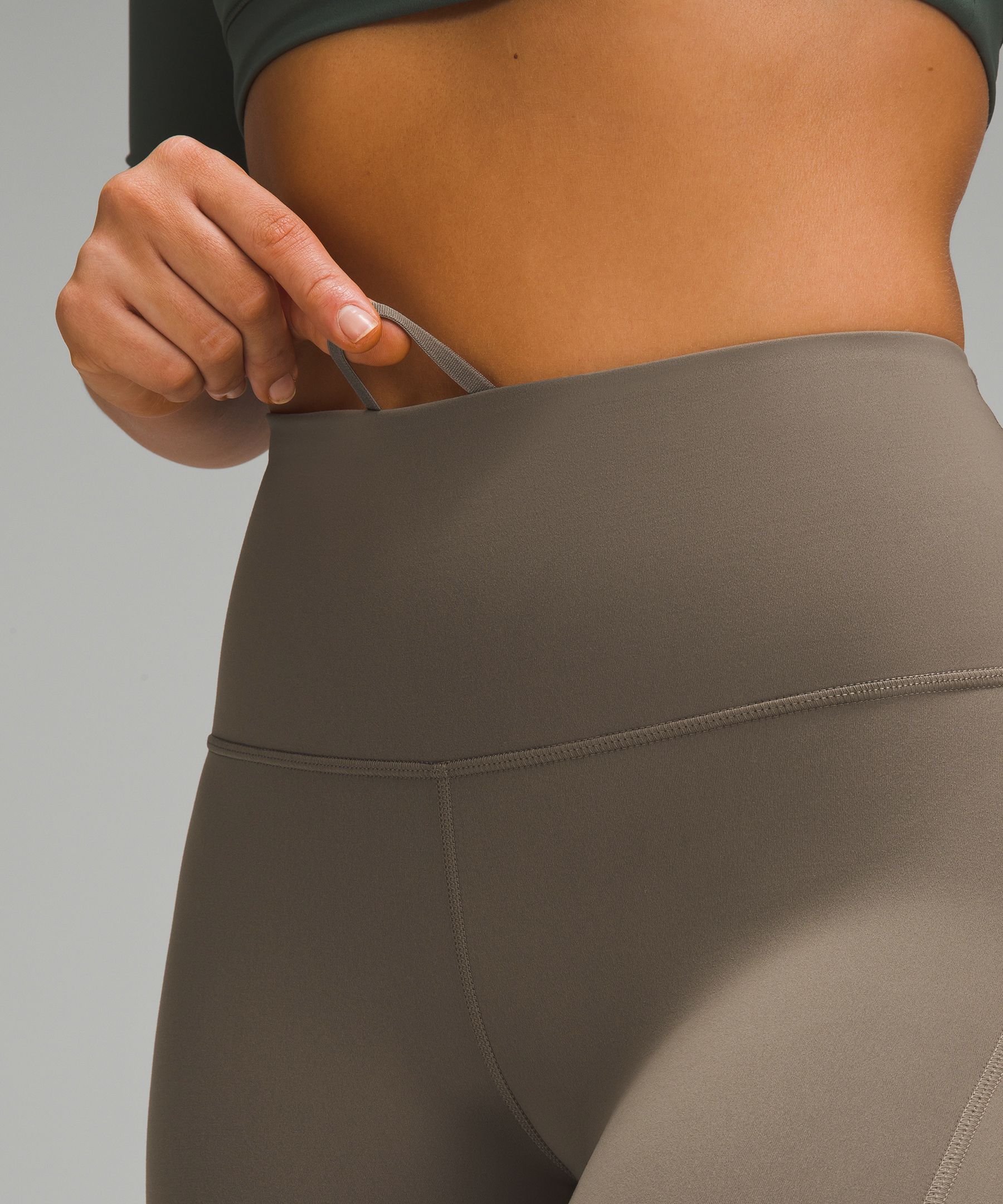 Wunder Train Contour Fit High-Rise Tight with Pockets 25" sold by Lululemon product image thumbnail 4