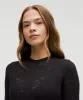Lace Crewneck Long-Sleeve Bodysuit sold by Lululemon