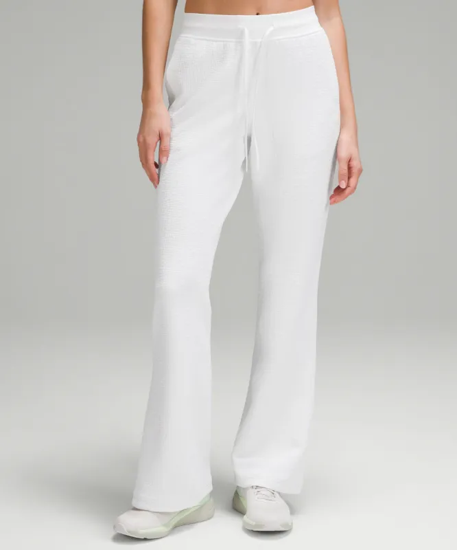 Textured High-Rise Flared Track Pant 32" sold by Lululemon