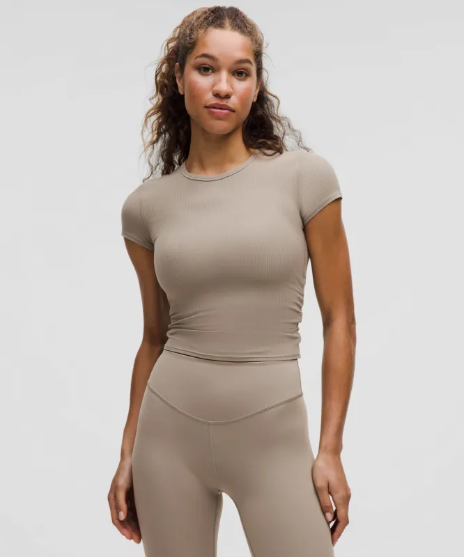 All It Takes Back-Twist Ribbed Short-Sleeve Shirt | Women's Short Sleeve Shirts & Tee's | lululemon sold by Lululemon