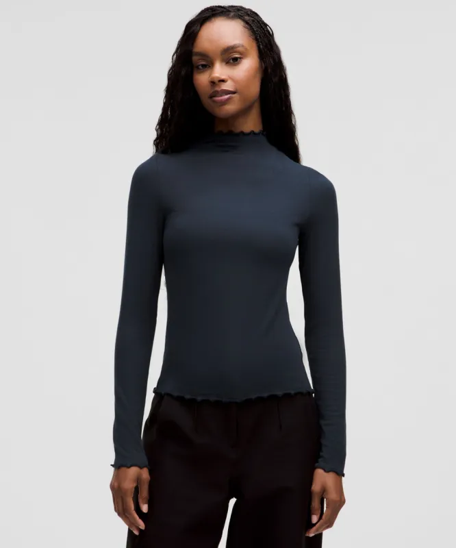 Hold Tight Lettuce-Edge Turtleneck sold by Lululemon