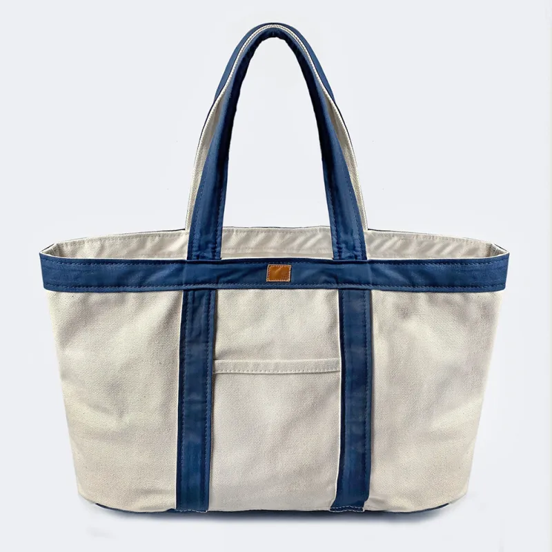 BZEN TOTE23-13P NATURAL CANVAS BODY WITH NAVY TRIM 23"W x 13"H OPEN TOP TOTE BAG WITH FRONT POCKET-22OZ-NAVY sold by Bzen