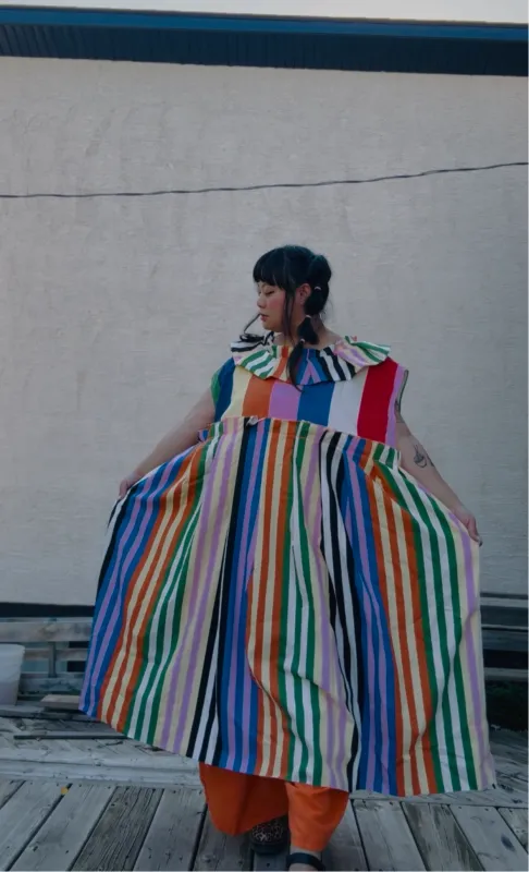 Pippa’s circus stripe dress sold by Hello Darling