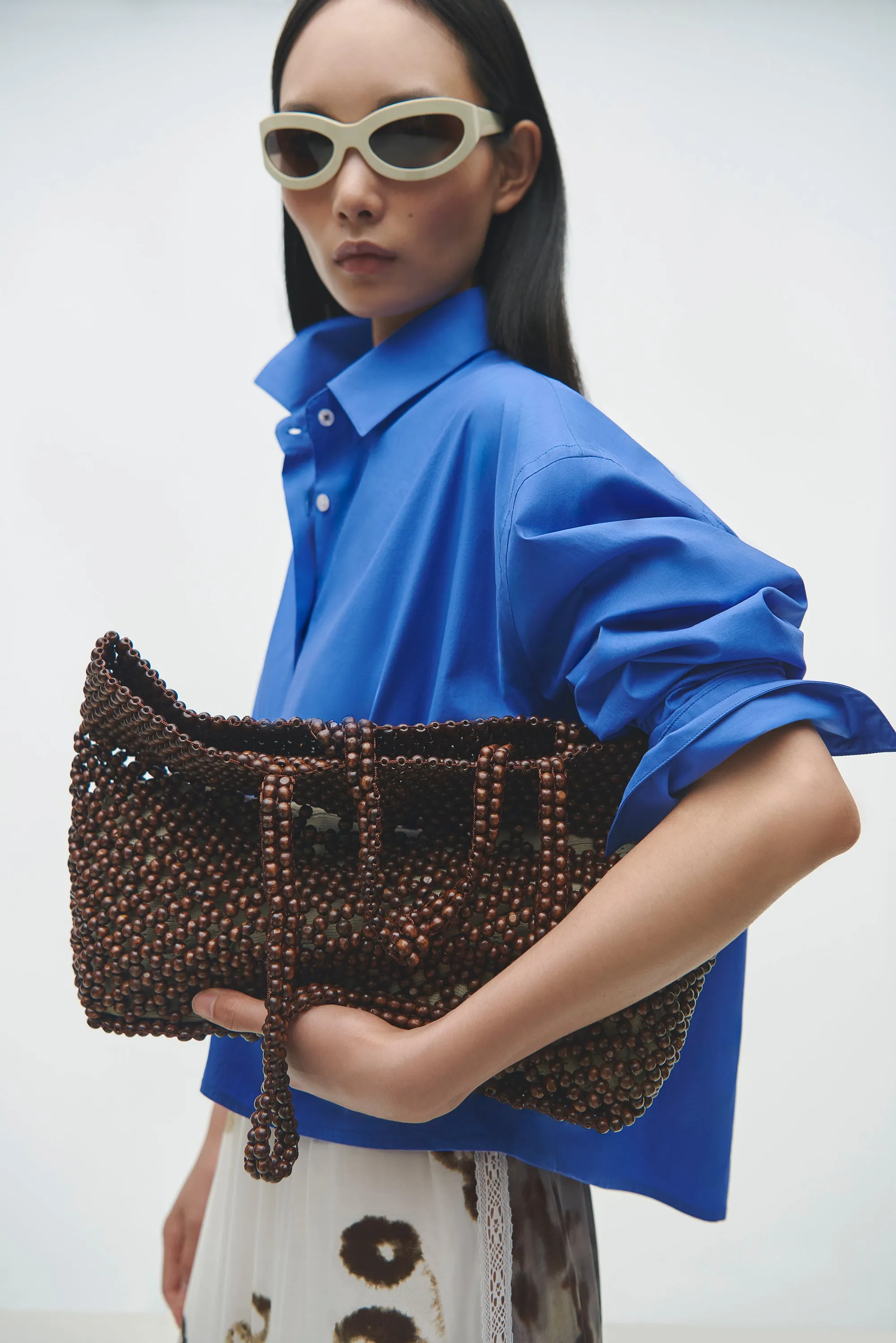 WOODEN BEADS BAG sold by Cordera