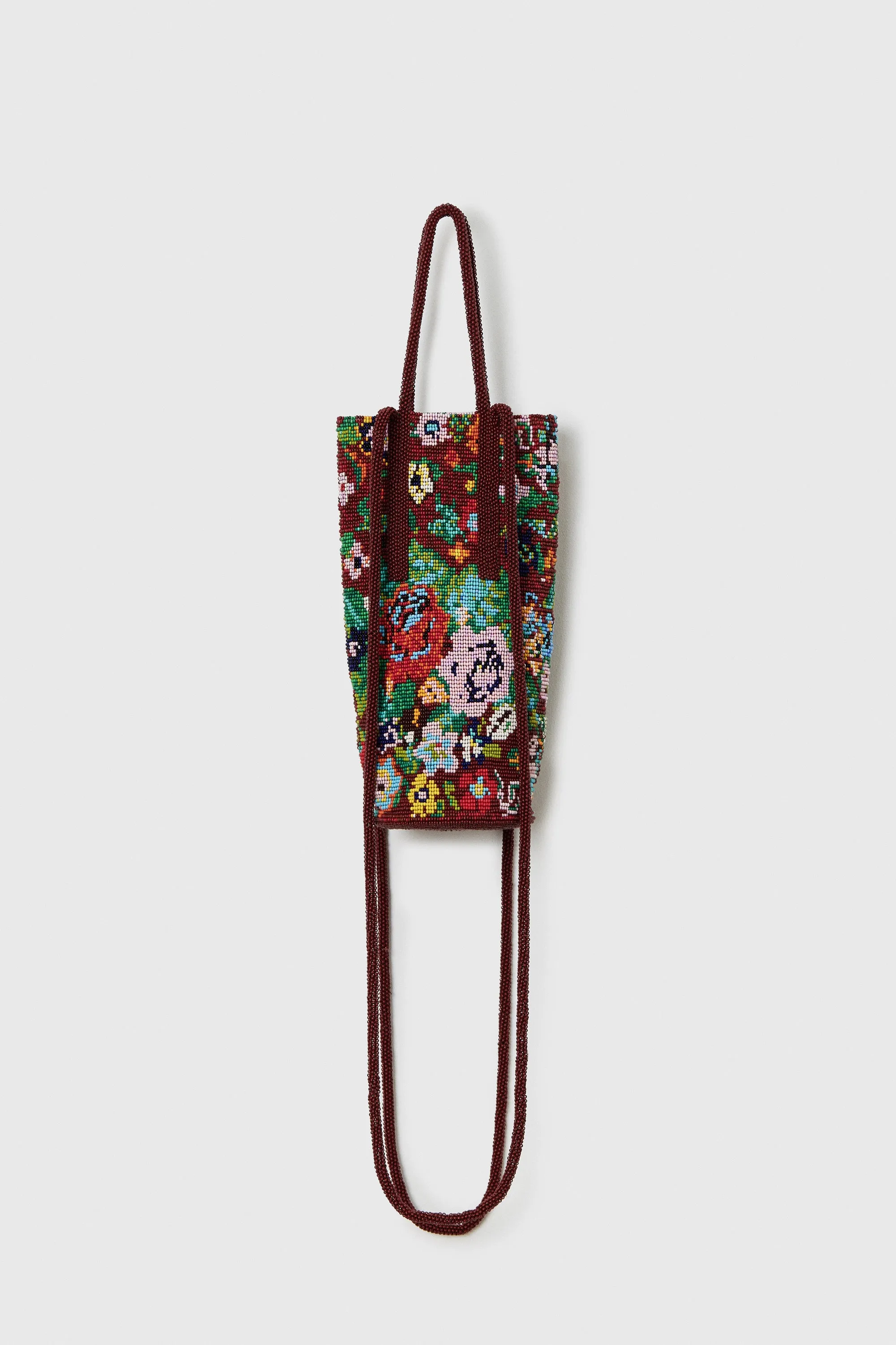 BEADED BAG FLORES sold by Cordera