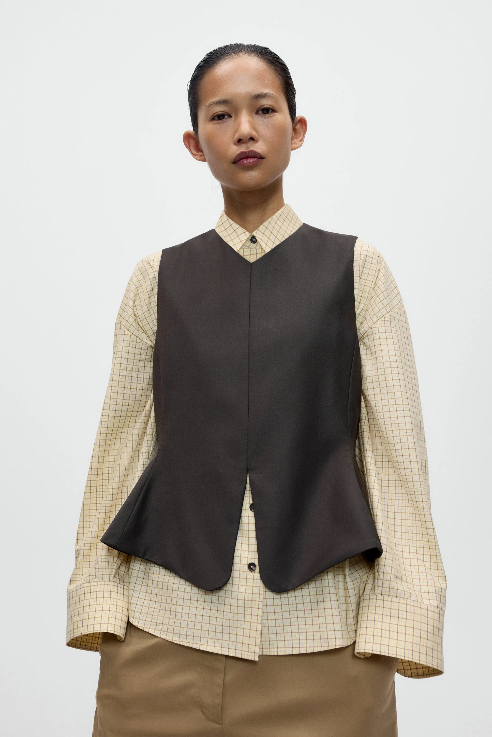 TAILORED PEPLUM VEST sold by Cordera