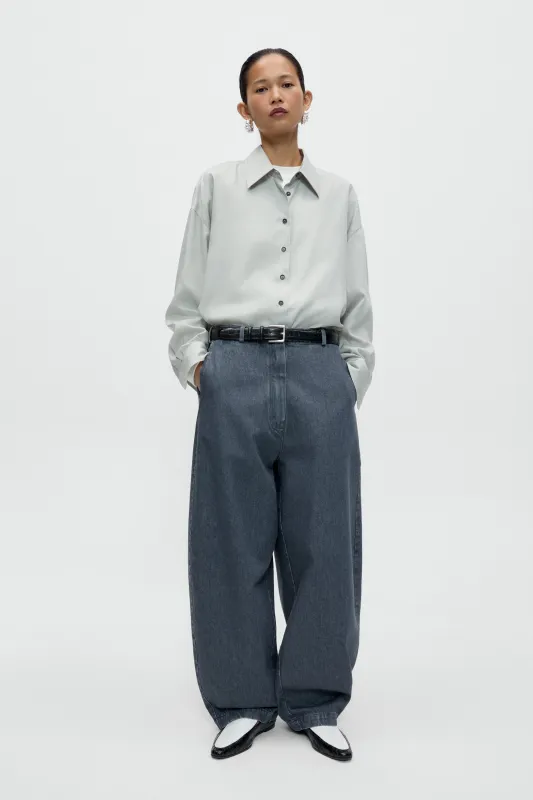 WASHED DENIM CURVED PANTS made by Cordera