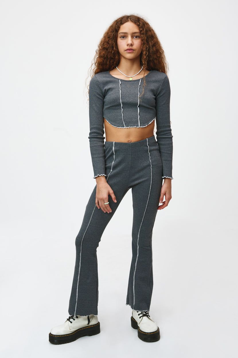 טייץ מתרחב ג'ניס סיומות גליות sold by Adika