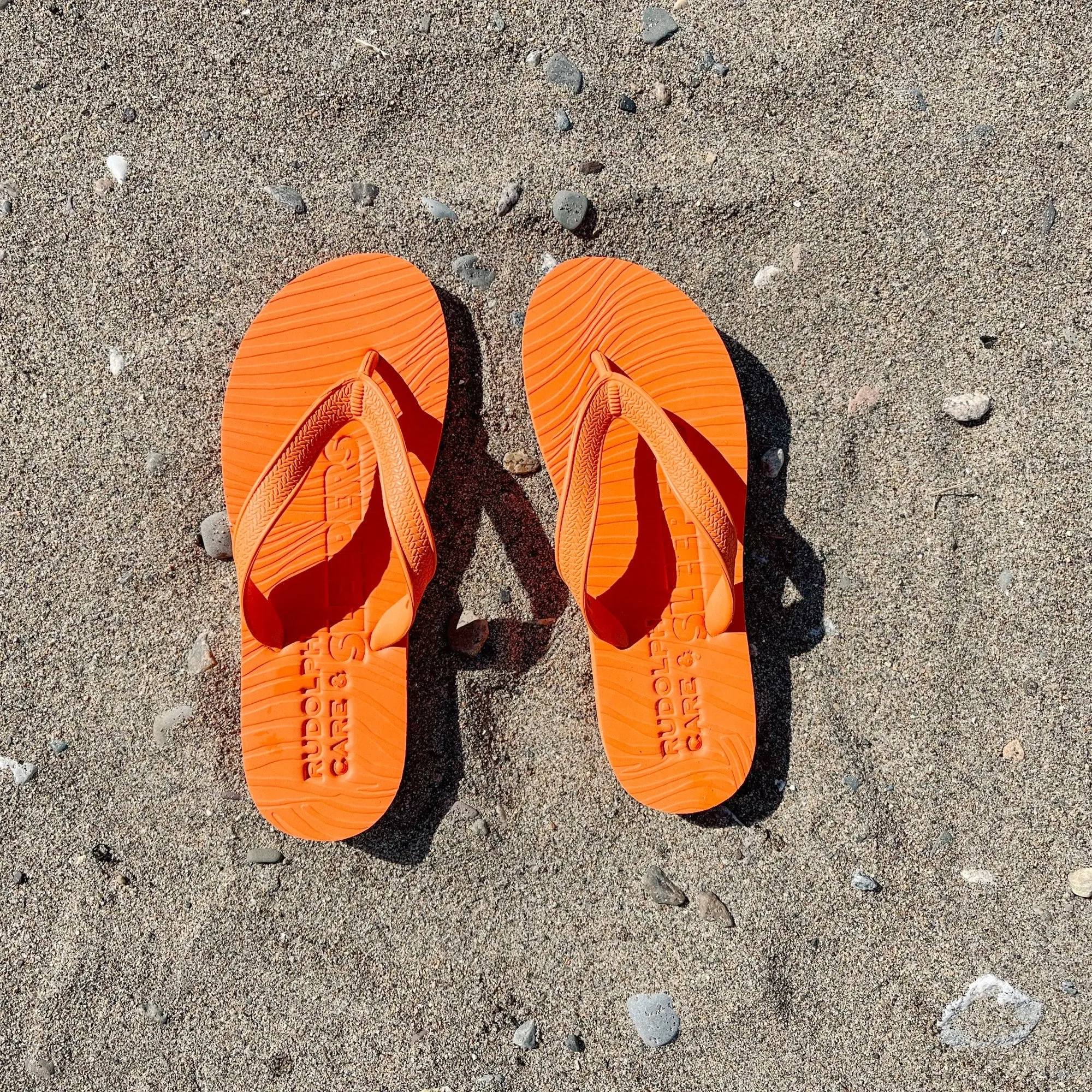Rudolph Care x Sleepers Orange Flip Flop sold by Sleepers