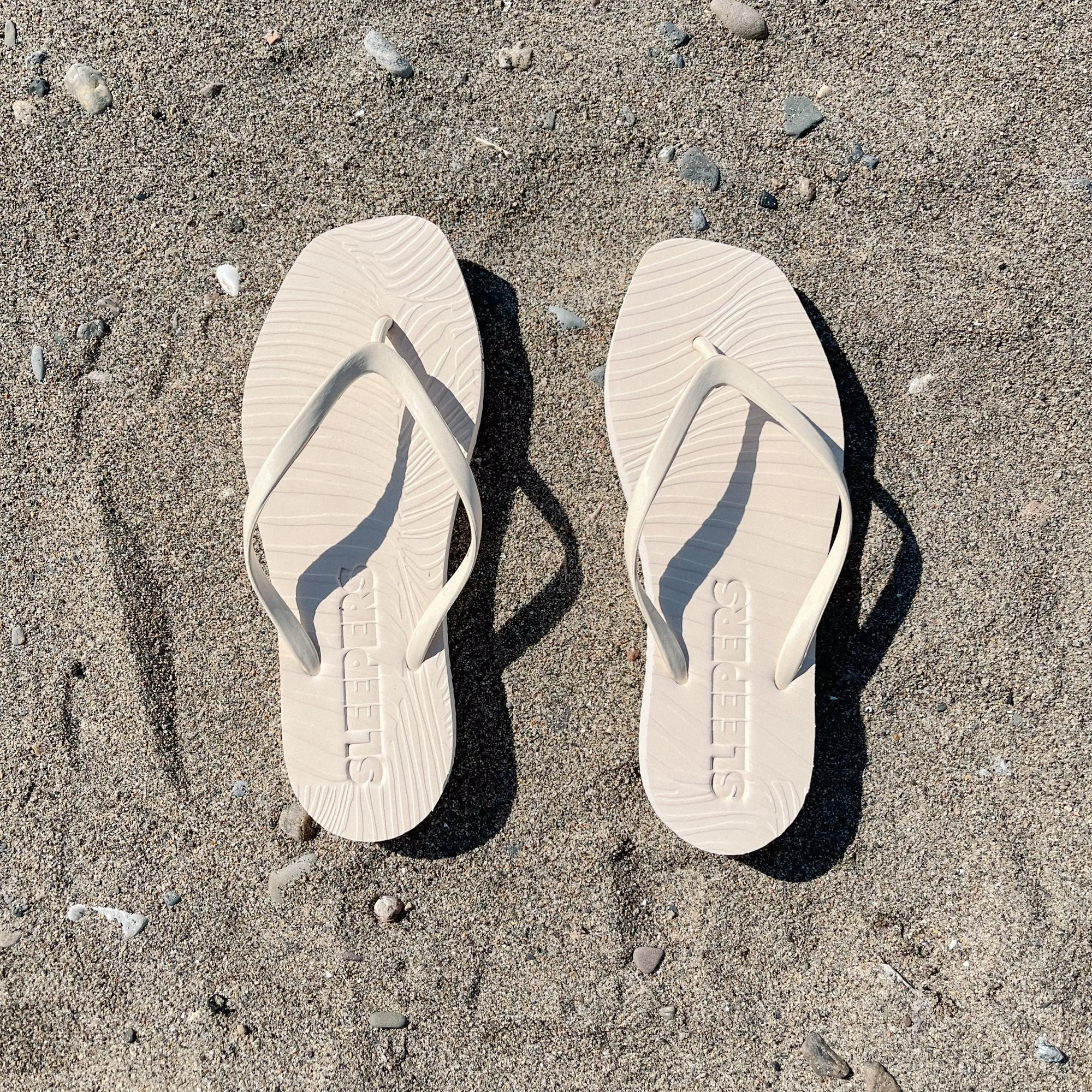 Tapered Eggnog Flip Flop sold by Sleepers