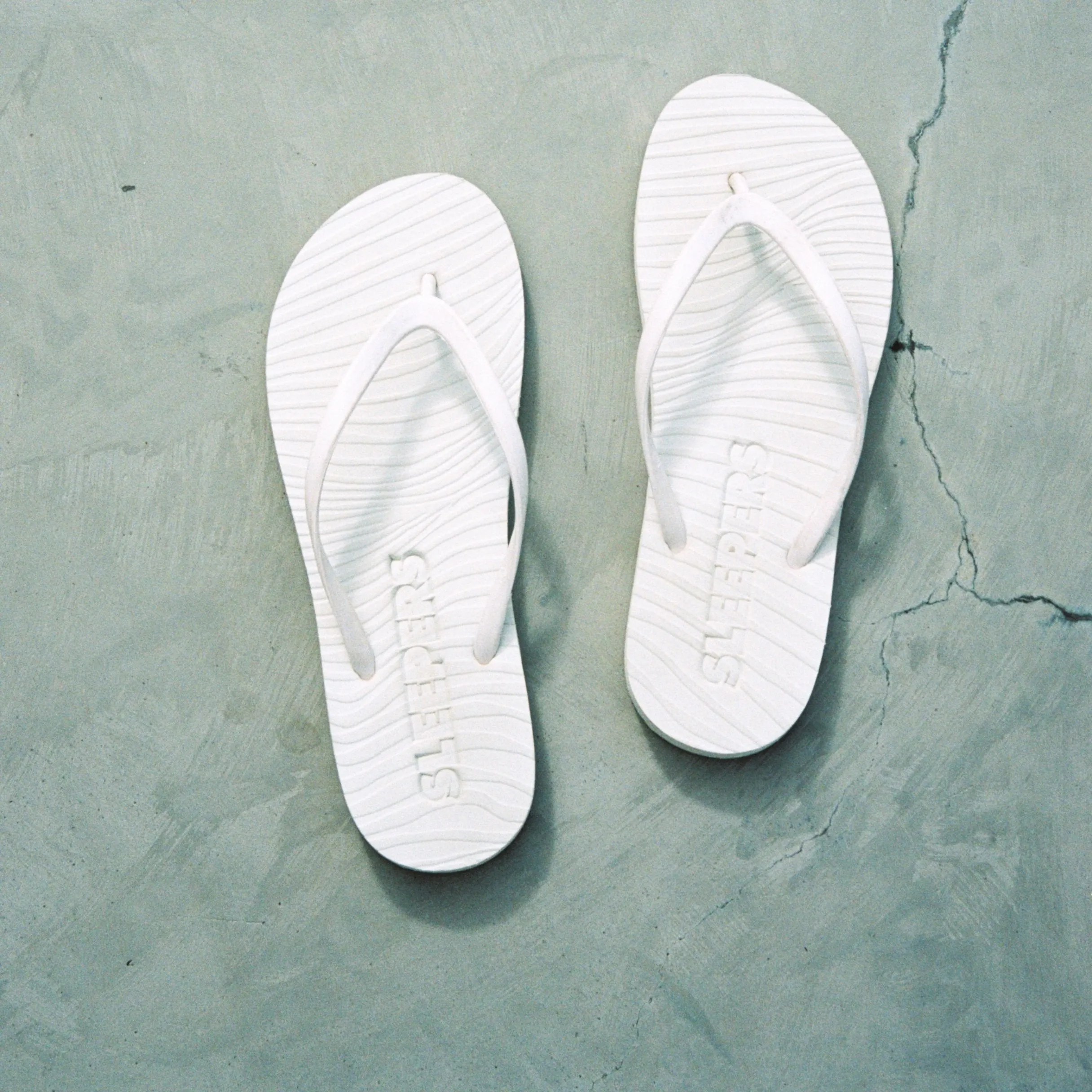Slim White Flip Flop sold by Sleepers
