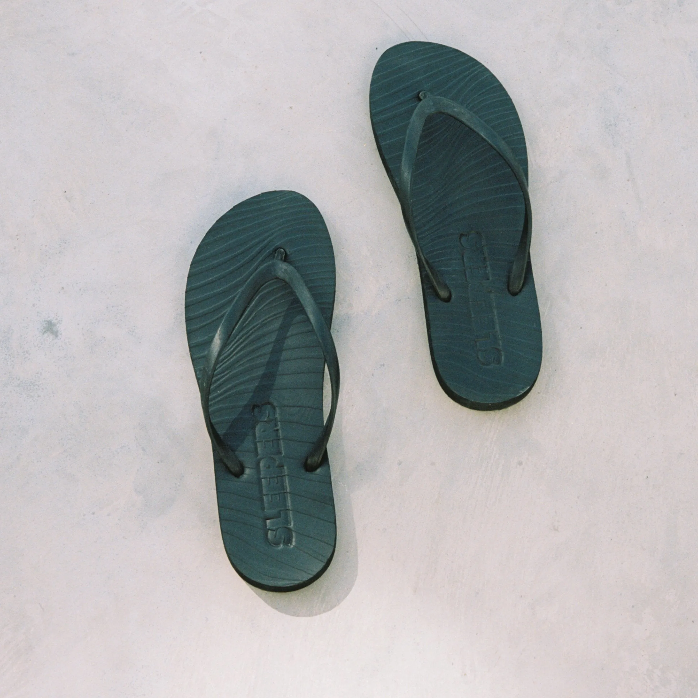 Slim Black Flip Flop sold by Sleepers